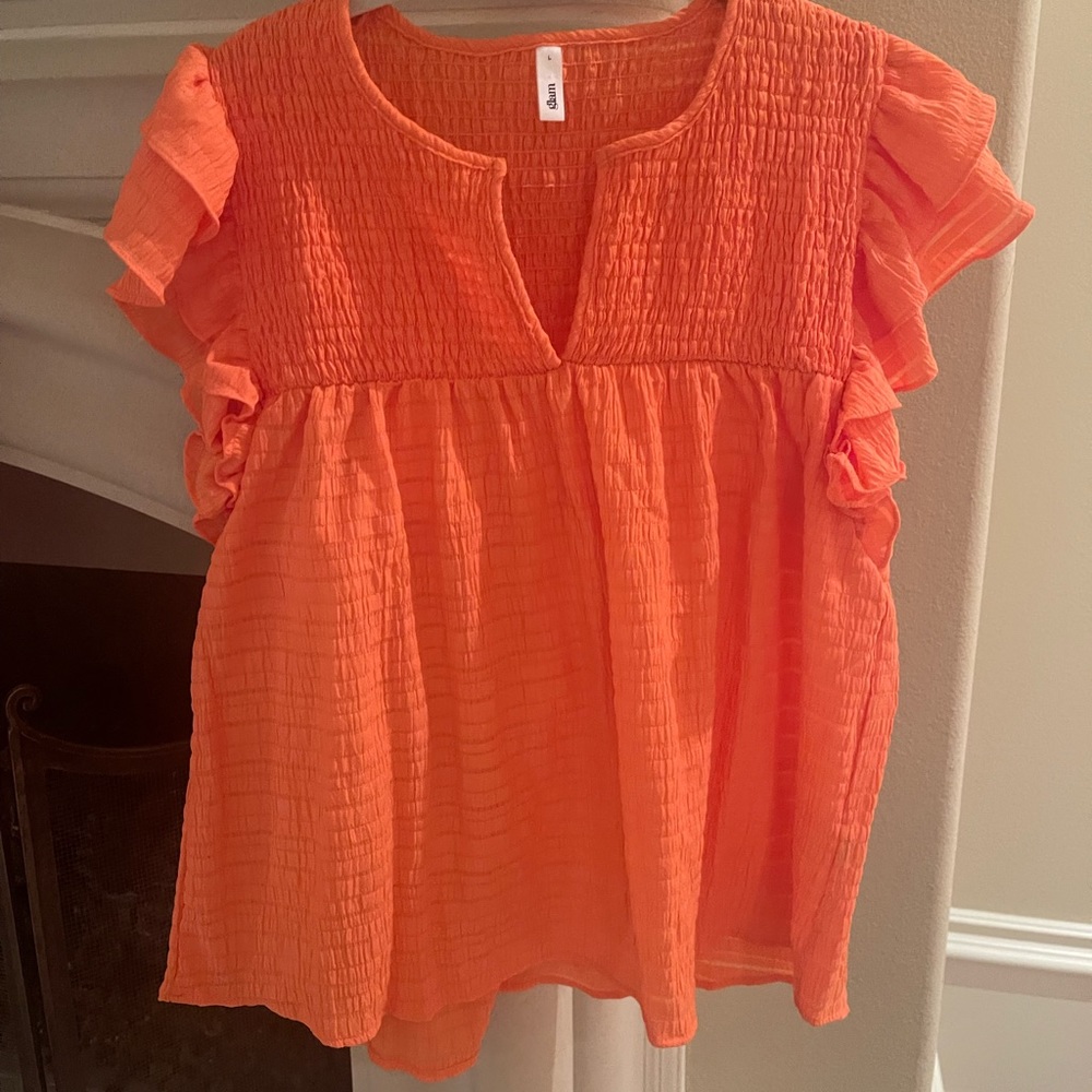 Coral top by Glam.